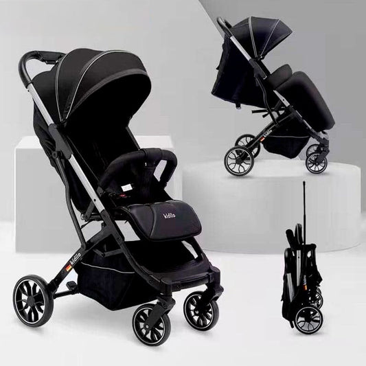 Coche paseador con plegado estilo maleta, espaldar ajustable, con freno de ruedas traseras, capota desplegable para cubrirlo del sol, y cubrepiés desmontable - Kidilo