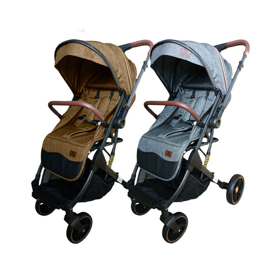 Coche paseador tipo maleta para bebé, con sistema de plegado compacto y ligero, combina acabados elegantes con material resistente, con cubrepiés y pañalera - Maxibaby