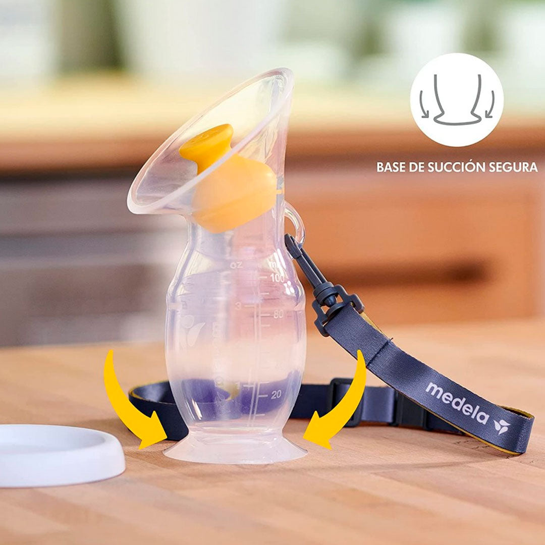 Hakka recolectora en silicona 100% BPA Free, de una capacidad de 100ml / 3.4 oz, con cordón para facilitar su uso, cuenta con tapa y base de sujeción segura - Medela